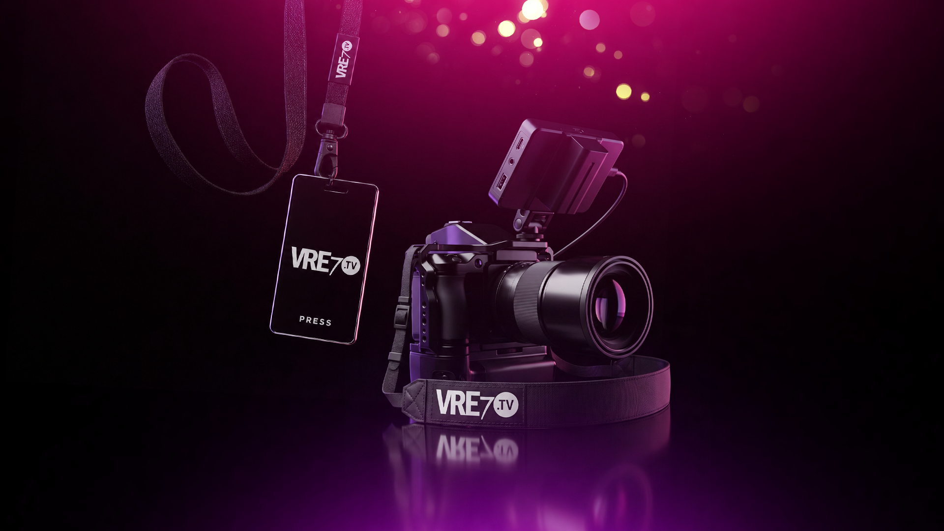 A VRE7 TV press badge on a lanyard next to a cinema camera under magenta bokeh lights