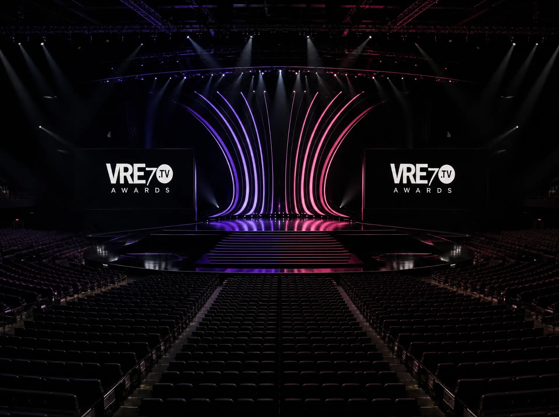 VRE7.TV Awards stage in an empty arena under purple and pink spotlights